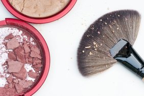 broken powder makeup and brush