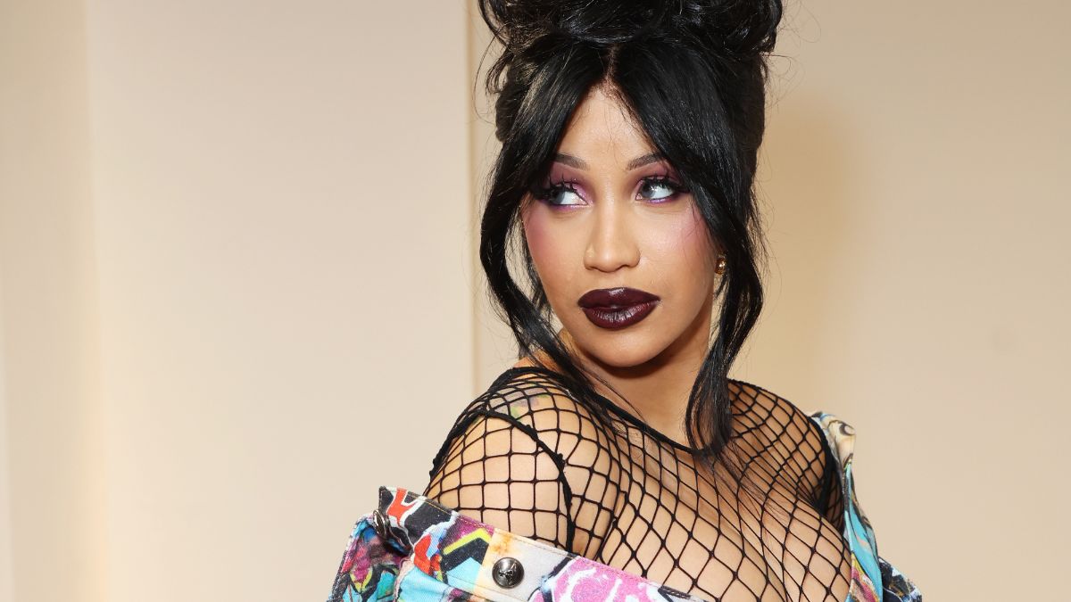 Cardi B Brings Punk Rock Chic to PFW With Corseted Graffiti Dress -  theFashionSpot