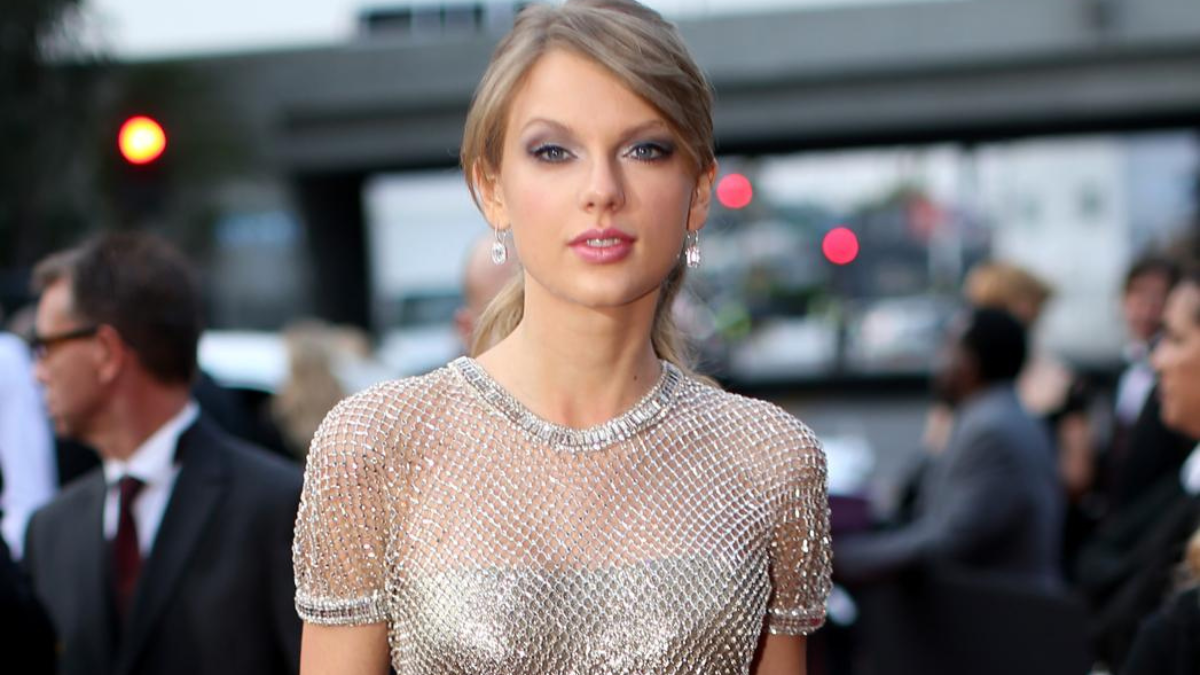 taylor swift grammy after party dress 2025 Taylor Swift swapped red dress for silver Gucci mini at Grammys 2025  afterparty