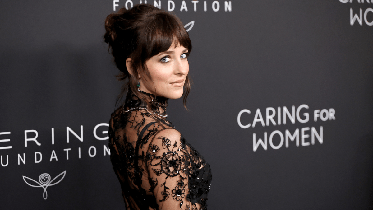 Photos Dakota Johnson Creates Ultra Glam Red Carpet Moment in Gucci’s Naked Dress theFashionSpot