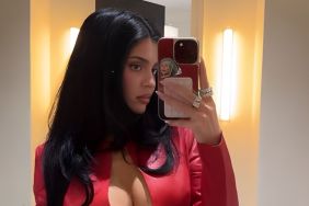 Kylie Jenner Sips on a Drink in Unzipped Crop Top