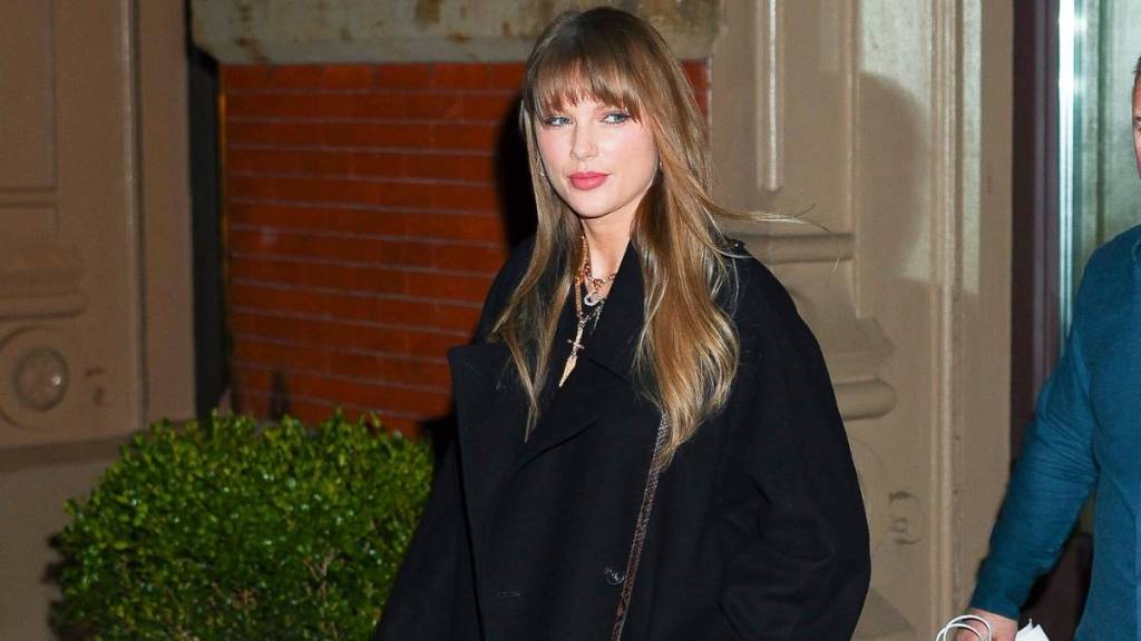Taylor Swift Cheers for Travis Kelce in Miu Miu Bomber Jacket
