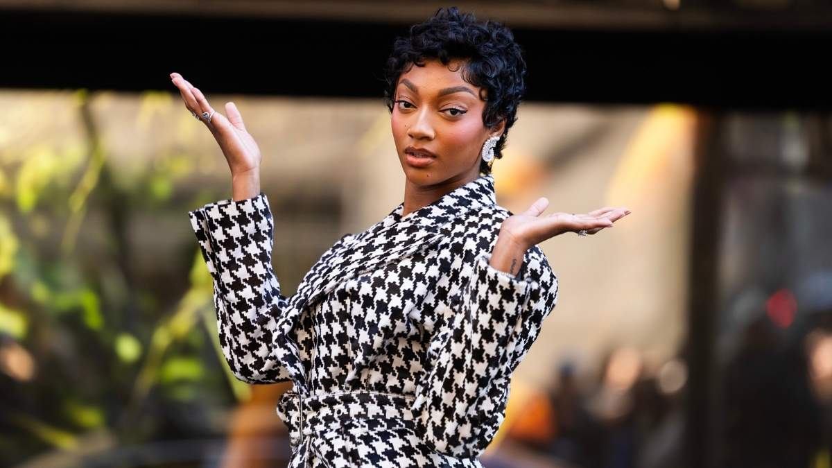 Angel Reese's LaQuan Smith Skirt Suit Comes With a Sky-High Slit ...