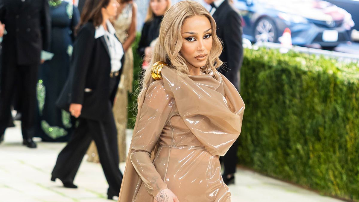 Doja Cat Boldly Leaves Balenciaga Shirt Unbuttoned for Plunging Look - theFashionSpot Doja Cat Boldly Leaves Balenciaga Shirt Unbuttoned for Plunging Look - theFashionSpot