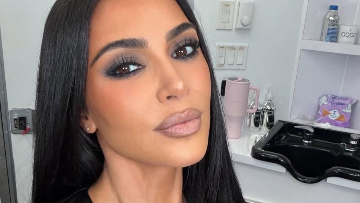 Kim Kardashian Leaves Her Coat Buttons Undone in Bold New Photos — free download