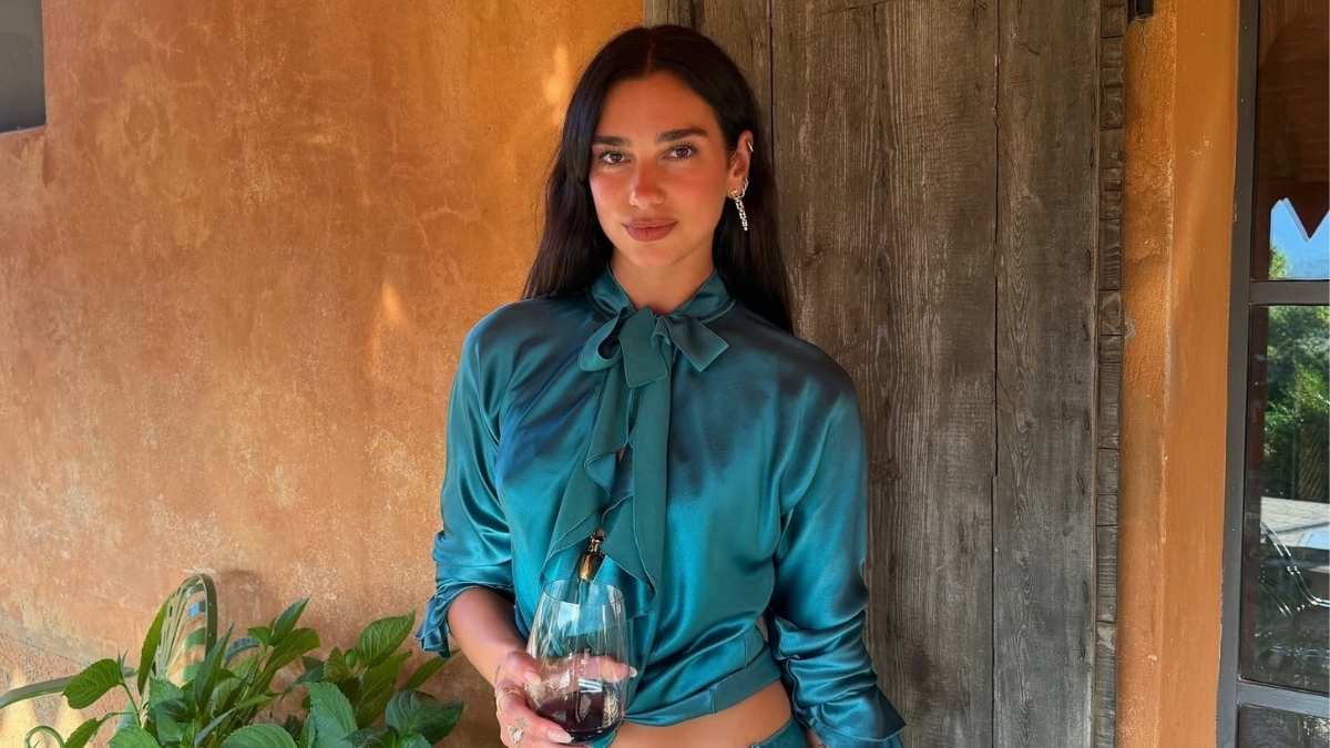 Dua Lipa's John Galliano Top Gets a Cutout Twist With Tie-up Detail