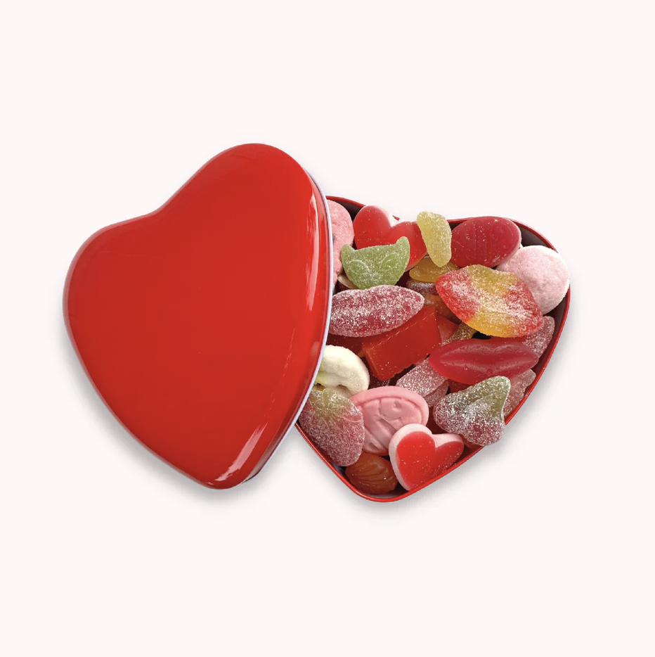 Sockerbit-Herz-Dose mit verschiedenen Süßigkeiten