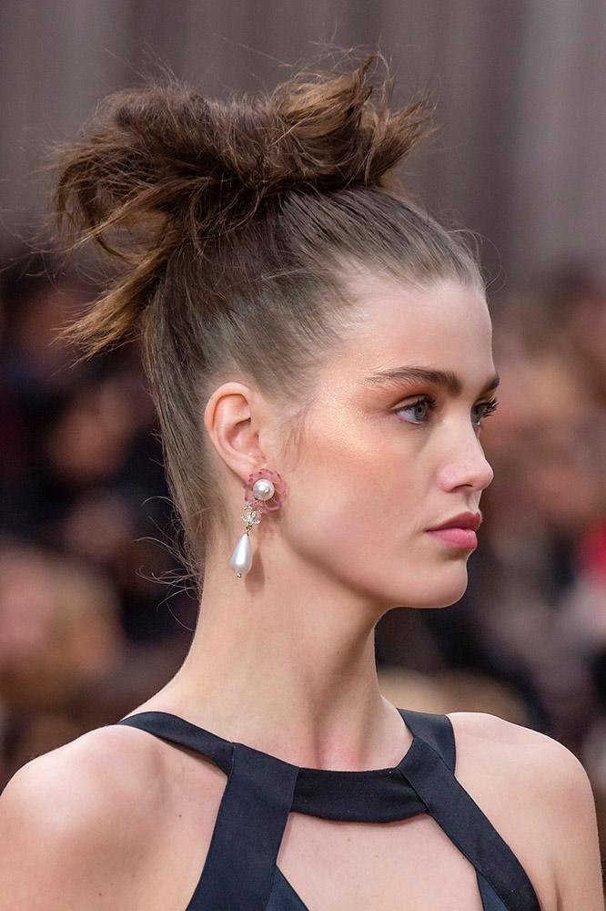 Chanel models wore messy buns on the runway